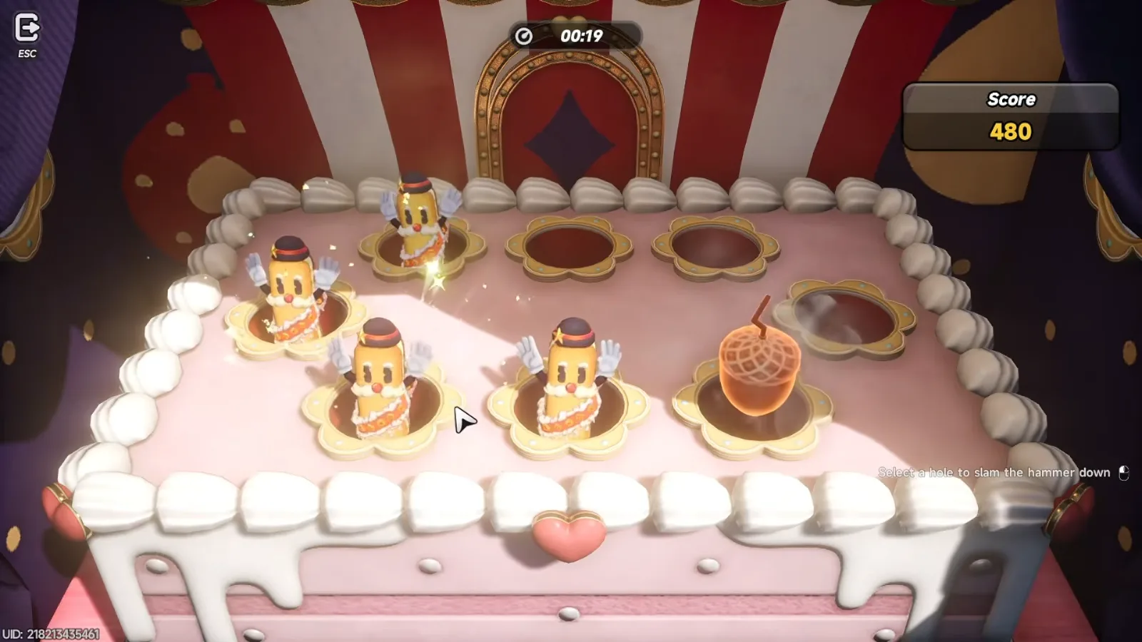 Whack-a-Puka on a pink cake board in NTE Pukaland, moles in hats popping up beside an acorn bonus, score 480