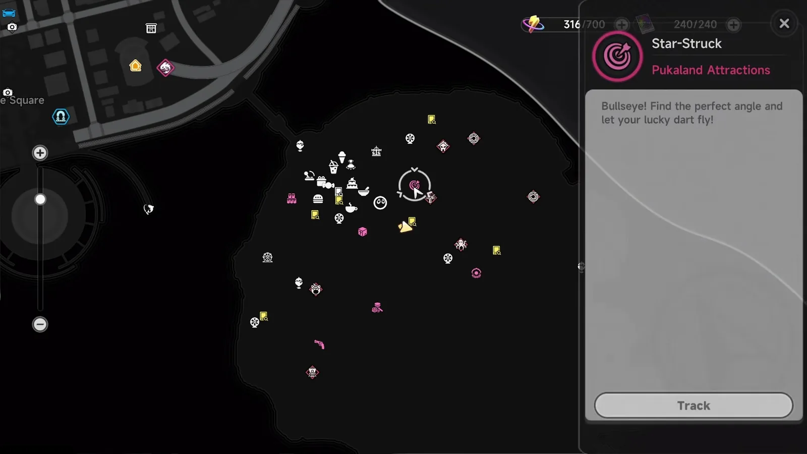 Pukaland on the NTE map with the Star-Struck darts attraction selected, its pink target icon listed under Pukaland Attractions